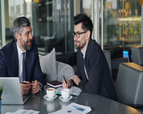business professionals discussing future technology trends